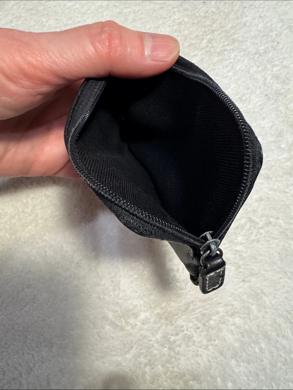 Fossil black leather mini wallet.